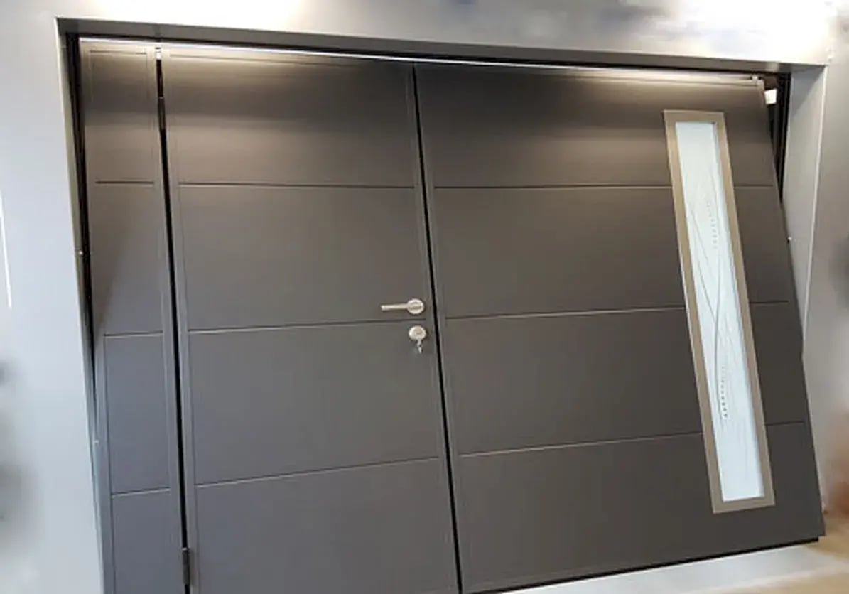 Porte garage basculante portillon hublot moos a2p tuquet
