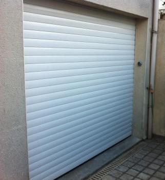 Porte garage enroulable deuil la barre 95