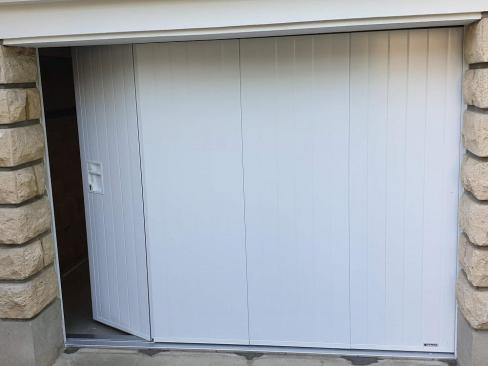 Porte garage laterale avec portillon st gratien 95 a2p tuquet